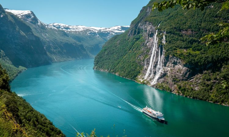 Seven-Sisters-waterfall-in-Geirangerfjord-Norway-shutterstock_2175697617_Mikolaj-Niemczewski-scaled